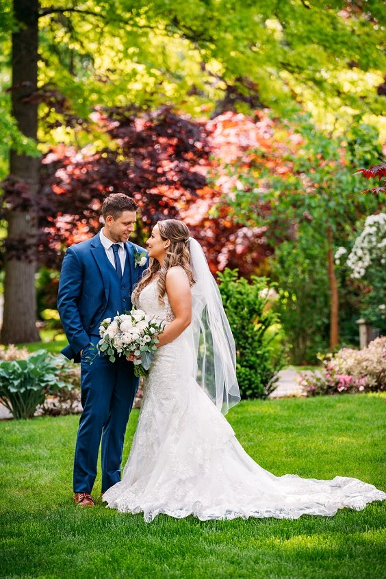 bride and groom looking at each other